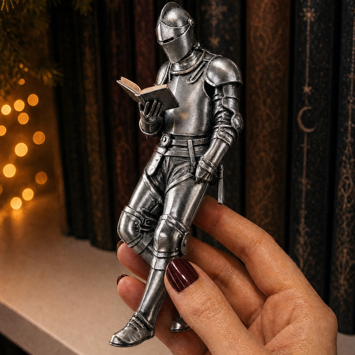A reader holding a small knight figurine